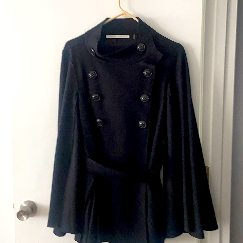 Bell sleeves w/slits.100% wool/lining.imported from Italy size 4